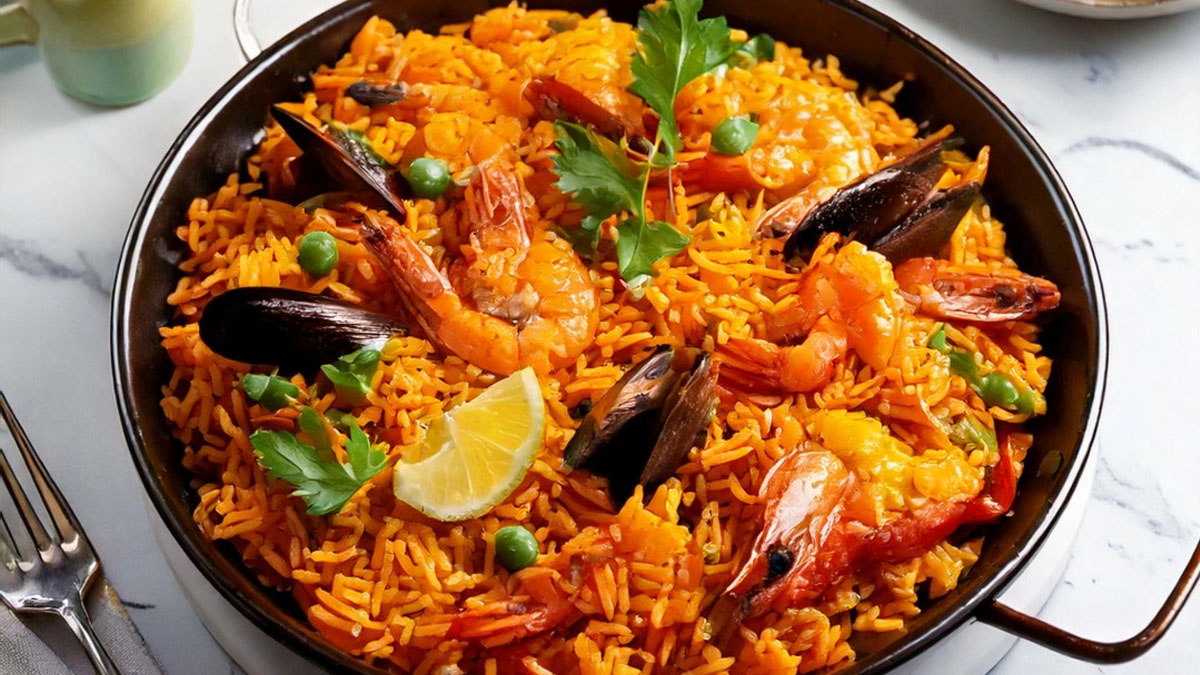 Make a Spanish Paella with Smoky Mezcal Paloma at The Joyful Gourmet